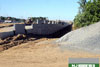 7/1/11: A retention wall goes up near Interchange 7.