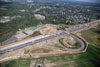 9/19/2011: A progress photo of the retention wall and lanes for the southbound outer roadway under construction, and construction on a retention wall (lower left corner) and piers for the northbound outer roadway can be seen in this photograph.