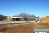February 2011: A view of the Windsor Road bridge as it is being demolished. The concrete must be removed from the steel, and then the steel is removed from the piers. The piers are then demolished  and the debris removed.