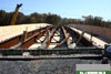 October 2011: A close up view of the placed beams for the Windsor Road bridge with shielding placed under and at the sides of the bridge structure to help keep workers and motorists safe.