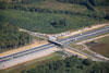 September 2011: An aerial view of the Perrineville Road bridge over the NJ Turnpike showing the Widening construction.