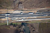 12/01/11: A view of Big Bear Creek with the culvert extensions constructed and new construction for the outer roadways in progress.