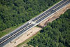 6/8/12: Earthwork for the northbound outer roadway and silt protection for the brook can be seen in this photograph at Cranbury Brook. The Contract 803 contractor will build an extension of the culvert and NJ Turnpike lanes over Cranbury Brook during the Widening Program.
