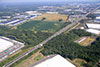8/20/10: An northern aerial view of the 803 contract area as seen from the light covered pavement over Cranbury Brook (approximate left center) to Service Area 7S (upper right corner).
